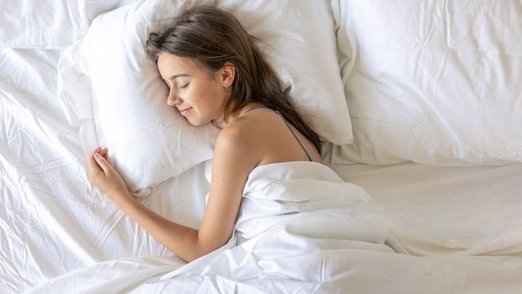 Woman sleeping peacefully in a safe and calm sleep environment